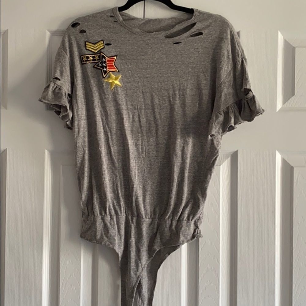 Dance & Marvelย Grey Patch Ruffle Sleeve Bodysuitโwith DistressedโHoles